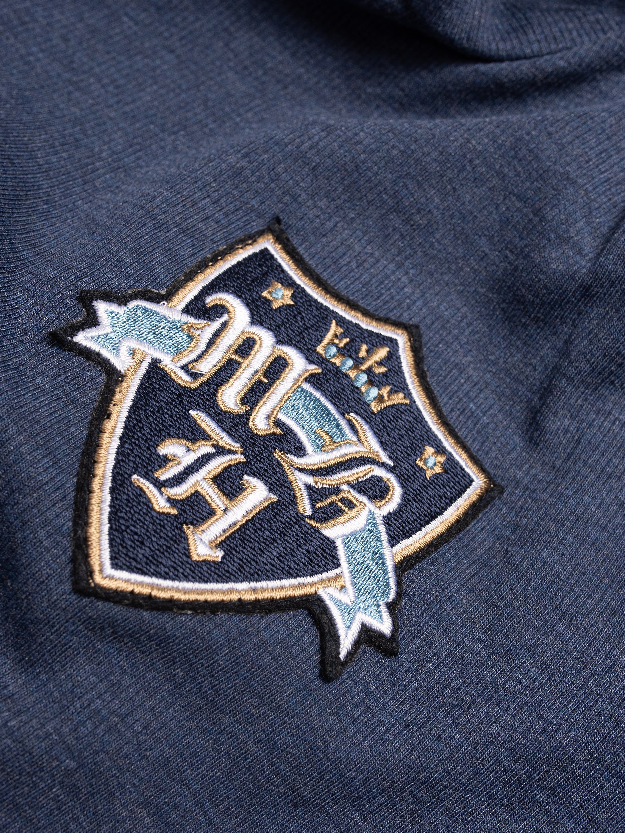Crest Polo Top